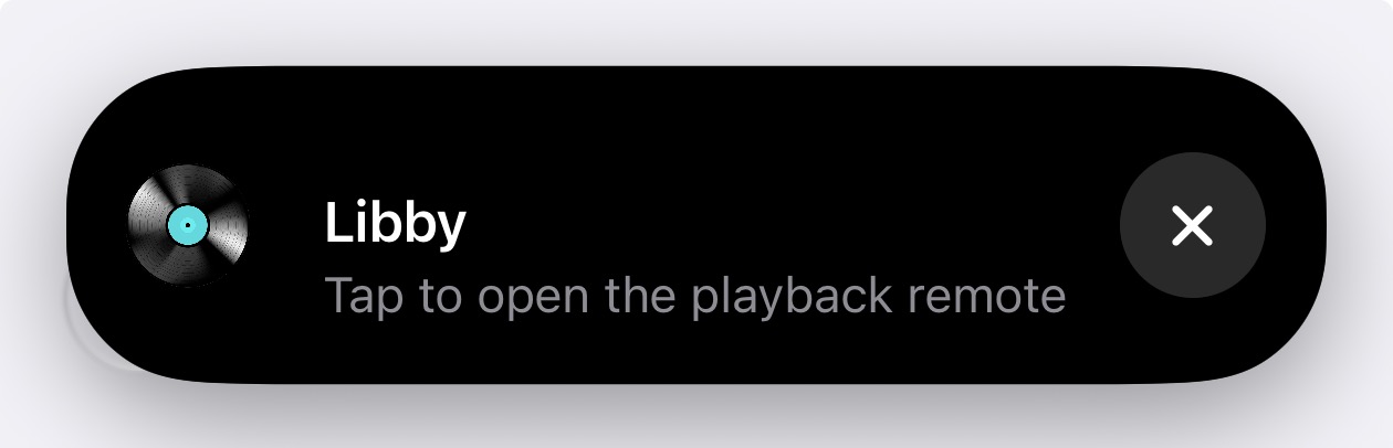 Expanded Dynamic Island with Libby’s icon and the message Tap to open the playback remote
