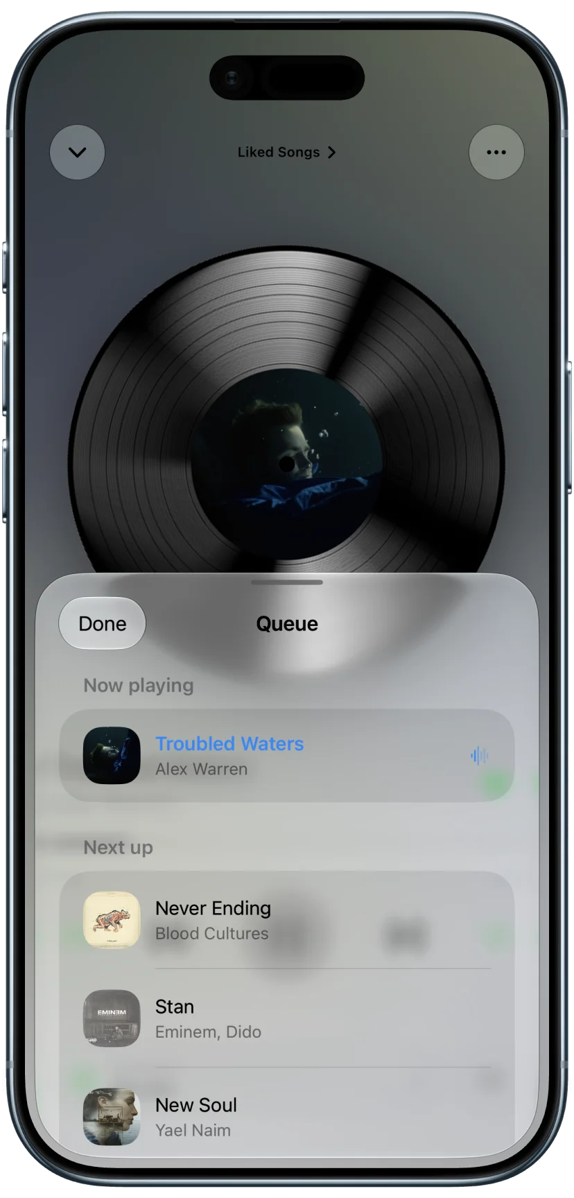 Playback queue overlaid on the vinyl record Now Playing view